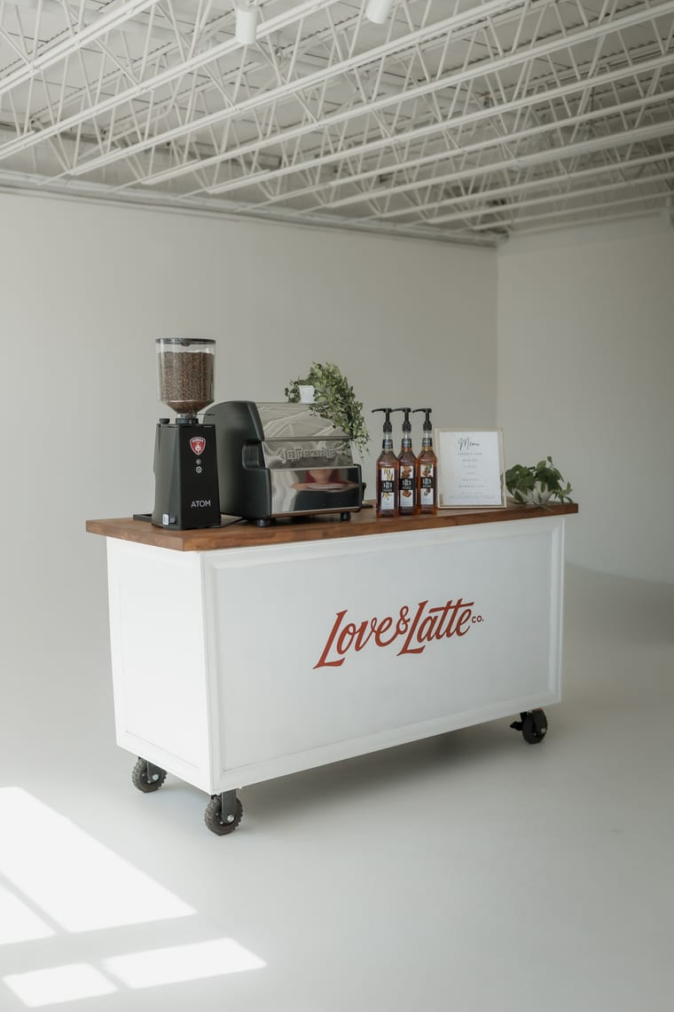 The compact Love and Latte cart seen from an angle, fully set up